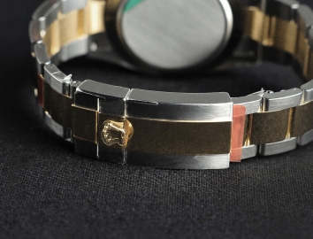 Rolex Cosmograph Daytona 40mm 116523 Gold Steel White Dial